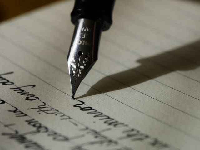 A pen writing