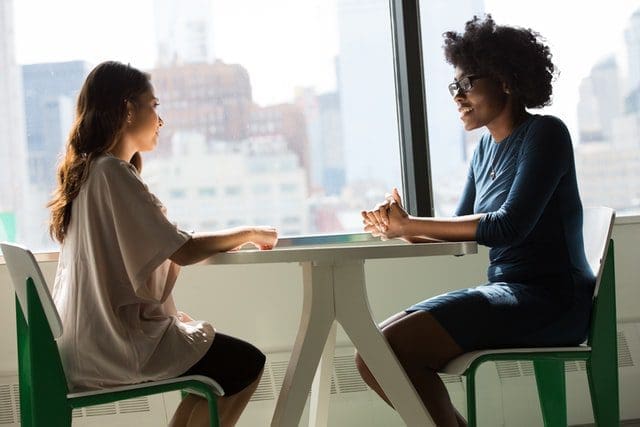 Two women meeting Two women meeting