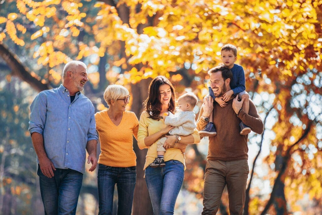 Multl generation family in autumn park having fun Multl generation family in autumn park having fun