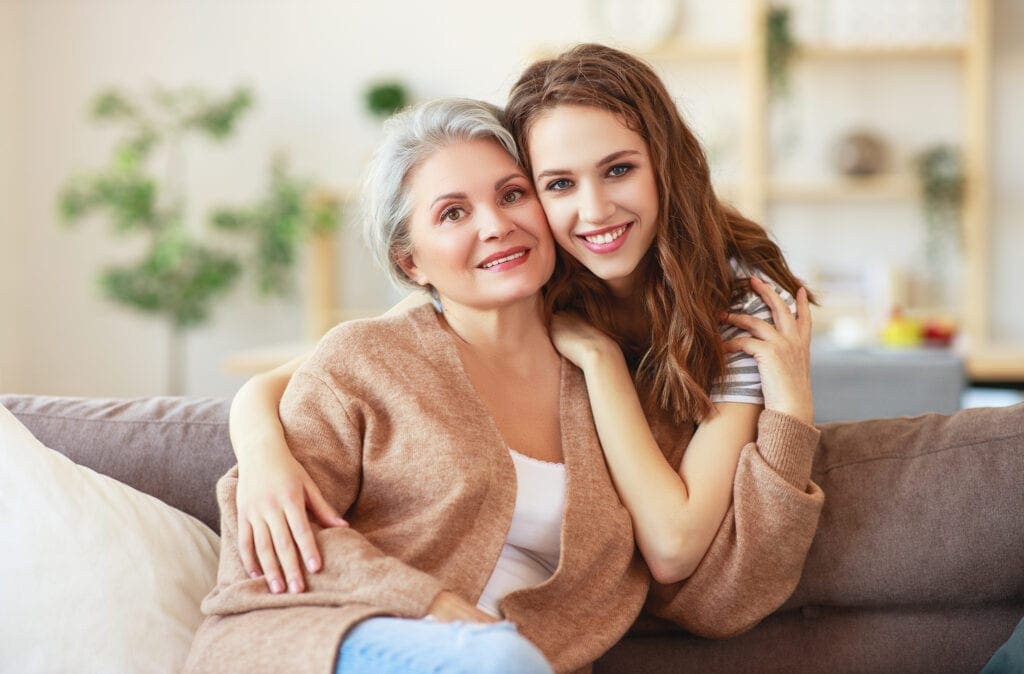 Happy family two generations old mother and adult daughter