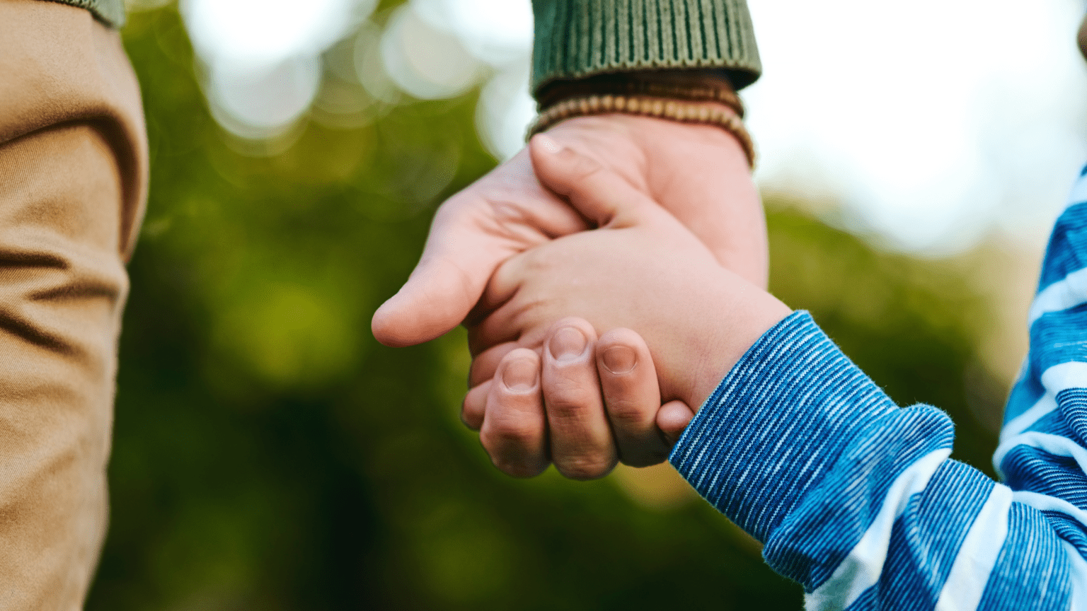 special-needs-family-support-holding-hands