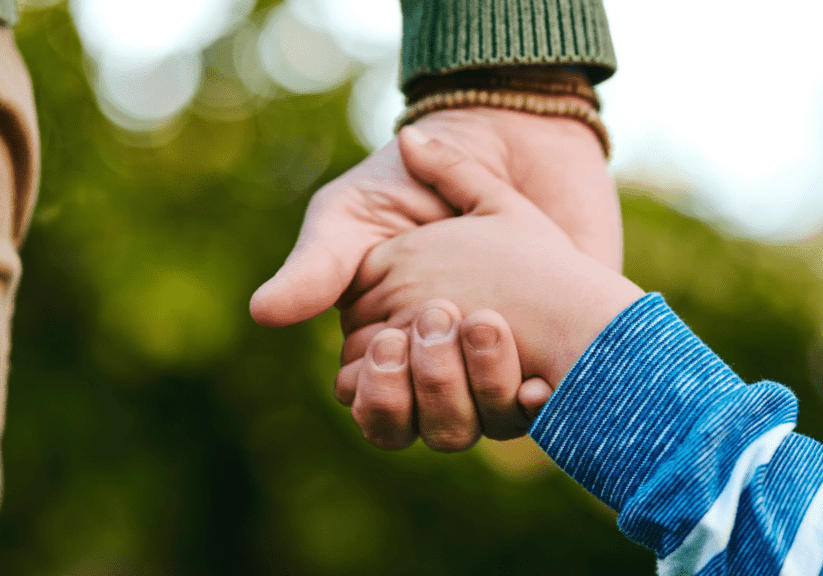 special-needs-family-support-holding-hands