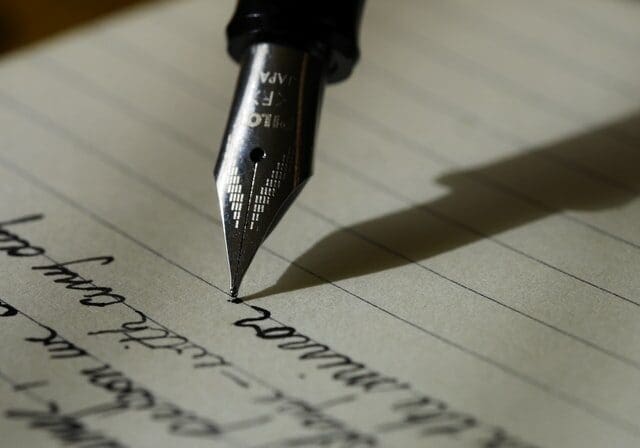 A pen writing